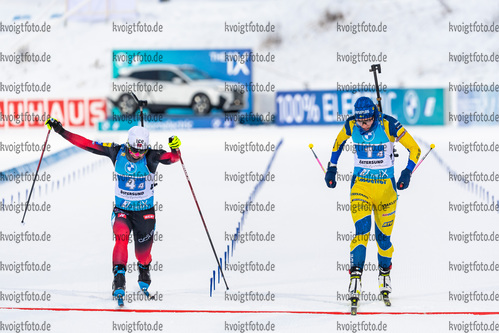 05.12.2021, xkvx, Biathlon IBU World Cup Oestersund, Relay Women, v.l. Marte Olsbu Roeiseland (Norway), Hanna Oeberg (Sweden) im Ziel / in the finish