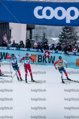 11.12.2021, xljkx, Cross Country FIS World Cup Davos, Men Sprint Final, v.l. Sergey Ustiugov (Russia), Johannes Hoesflot Klaebo (Norway), Erik Valnes (Norway)  / 