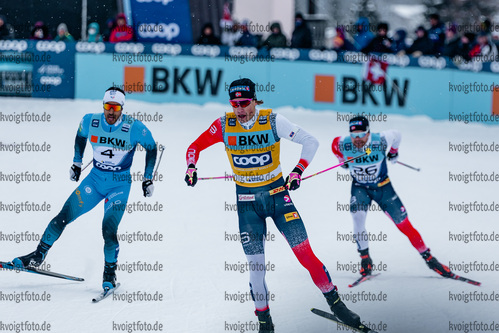 11.12.2021, xljkx, Cross Country FIS World Cup Davos, Men Sprint Final, v.l. Johannes Hoesflot Klaebo (Norway), Richard Jouve (France), Haavard Solaas Taugboel (Norway)  / 