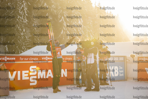 18.12.2021, xkvx, Biathlon IBU World Cup Le Grand Bornand, Pursuit Men, v.l. Quentin Fillon Maillet (France) bei der Siegerehrung / at the medal ceremony
