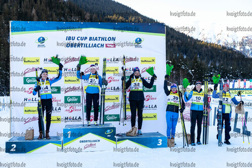 18.12.2021, Biathlonzentrum, Obertilliach, AUT, IBU Cup, Obertilliach 2021, Sprint, Damen, Siegerehrung, im Bild v.l. 2. Platz Paula Botet (FRA), 1.Platz Anastasia Shevchenko (RUS), 3. Platz Karoline Offigstad Knotten (NOR), Evgeniya Burtasova (RUS), Camille Bened (FRA), Franziska Hildebrand (GER) // f.l. second placed Paula Botet of France winner Anastasia Shevchenko of Russian Federation third placed Karoline Offigstad Knotten of Norway Evgeniya Burtasova of Russian Federation Camille Bened of France Franziska Hildebrand of Germany during the winner cermony for the women sprint competition of IBU Cup at the Biathlonzentrum in Obertilliach, Austria on 2021/12/18. EXPA Pictures © 2021, PhotoCredit: EXPA/ Lukas Huter via VOIGT Fotografie