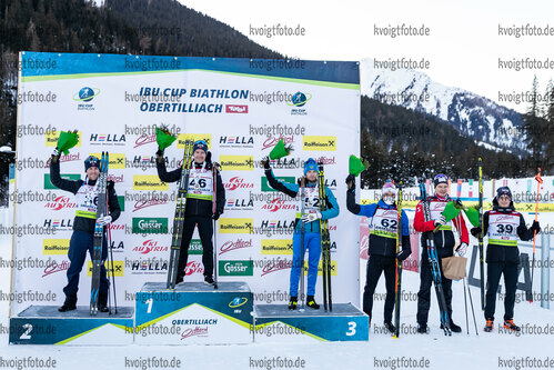 18.12.2021, Biathlonzentrum, Obertilliach, AUT, IBU Cup, Obertilliach 2021, Sprint, Herren, Siegerehrung, im Bild v.l. 2. Platz Erlend Bjoentegaard (NOR), 1. Platz Haavard Gutuboe Bogetveit (NOR), 3. Platz Maxim Tsvetkov (RUS), Emilien Claude (FRA), Harald Lemmerer (AUT), Sverre Dahlen Aspenes (NOR) // f.l. second placed Erlend Bjoentegaard of Norway winner Haavard Gutuboe Bogetveit of Norway third placed Maxim Tsvetkov of Russian Federation Emilien Claude of France Harald Lemmerer of Austria Sverre Dahlen Aspenes of Norway during the winner ceremony for the men sprint competition of IBU Cup at the Biathlonzentrum in Obertilliach, Austria on 2021/12/18. EXPA Pictures © 2021, PhotoCredit: EXPA/ Lukas Huter via VOIGT Fotografie