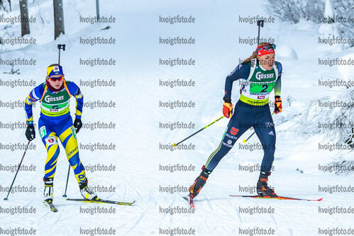 19.12.2021, xlukx, Biathlon IBU Cup Obertilliach, Mixed Relay, v.l. v.l. Ekaterina Bekh (UKR), Hanna Kebinger (GER)  / f.l. Ekaterina Bekh of Ukraine, Hanna Kebinger of Germany