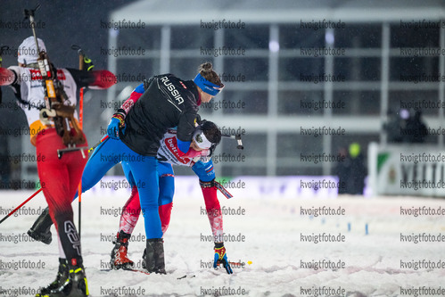 28.12.2021, xkvx, Biathlon WTC Ruhpolding 2021, v.l. Evgeniya Burtasova (Russia), Matvey Eliseev (Russland) im Ziel / in the finish
