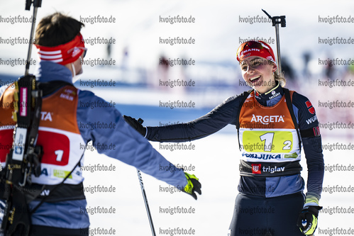 16.01.2022, xsoex, Biathlon IBU Junior Cup Pokljuka, Single Mixed Relay, v.l. Florian Martin Arsan (Germany), Johanna Puff (Germany) im Ziel / in the finish