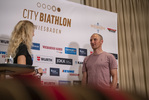 14.08.2021, xkvx, City Biathlon Wiesbaden 2021, v.l. Anja Froehlich (ZDF), Erik Lesser (Germany)  / 