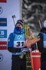 17.12.2021, xkvx, Biathlon IBU World Cup Le Grand Bornand, Sprint Men, v.l. Quentin Fillon Maillet (France) bei der Siegerehrung / at the medal ceremony