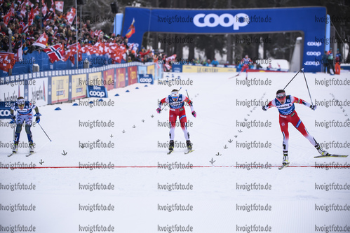 28.12.2019, xkvx, Langlauf Tour de Ski Lenzerheide, Massenstart Damen, v.l. Ebba Andersson (Sweden), Ingvild Flugstad Oestberg (Norway) and Heidi Weng (Norway) im Ziel / in the finish
