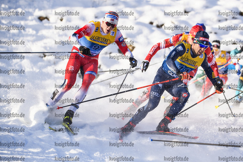 28.12.2019, xkvx, Langlauf Tour de Ski Lenzerheide, Massenstart Herren, v.l. Erik Valnes (Norway) and Federico Pellegrino (Italy) in aktion / in action competes