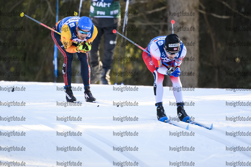 01.01.2020, xkvx, Langlauf Tour de Ski Toblach, Pursuit Herren, v.l. Lucas Boegl (Germany) and Hans Christer Holund (Norway)  / 