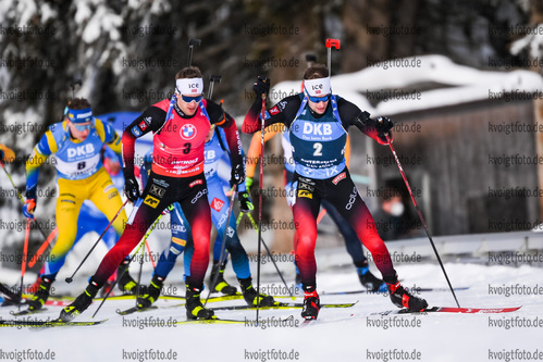 24.01.2021, xkvx, Biathlon IBU Weltcup Antholz, Massenstart Herren, v.l. Tarjei Boe (Norway) und Sturla Holm Laegreid (Norway)  / 