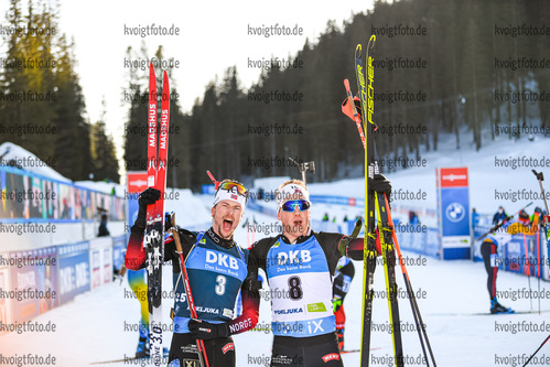 21.02.2021, xkvx, Biathlon IBU World Championships Pokljuka, Massenstart Herren, v.l. Sturla Holm Laegreid (Norway) und Johannes Dale (Norway) im Ziel / in the finish