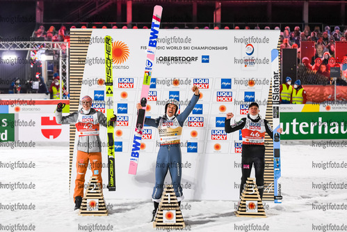 27.02.2021, xkvx, Nordic World Championships Oberstdorf, v.l. Karl Geiger of Germany, Piotr Zyla of Poland, Anze Lanisek of Slovenia  /
