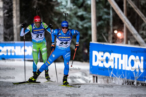 02.12.2021, xkvx, Biathlon IBU World Cup Oestersund, Sprint Men, v.l. Lukas Hofer (Italy), Jakov Fak (Slovenia) in aktion / in action competes
