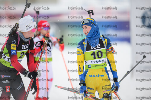 04.12.2021, xetx, Biathlon IBU Cup Sjusjoen, Mass Start Women, v.l. Aasne Skrede (NORWAY), Ella Halvarsson (SWEDEN)  / 
