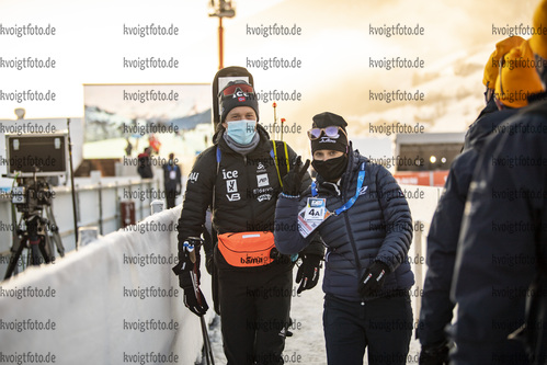 17.12.2021, xkvx, Biathlon IBU World Cup Le Grand Bornand, Sprint Men, v.l. Tarjei Boe (Norway), Lucie Lacroix schaut / looks on