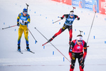 24.01.2021, xkvx, Biathlon IBU Weltcup Antholz, Massenstart Herren, v.l. Sebastian Samuelsson (Sweden) und Sturla Holm Laegreid (Norway)  / 