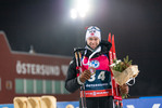 27.11.2021, xkvx, Biathlon IBU World Cup Oestersund, Individual Men, v.l. Sturla Holm Laegreid (Norway) bei der Siegerehrung / at the medal ceremony