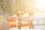 18.12.2021, xkvx, Biathlon IBU World Cup Le Grand Bornand, Pursuit Men, v.l. Sturla Holm Laegreid (Norway) bei der Siegerehrung / at the medal ceremony